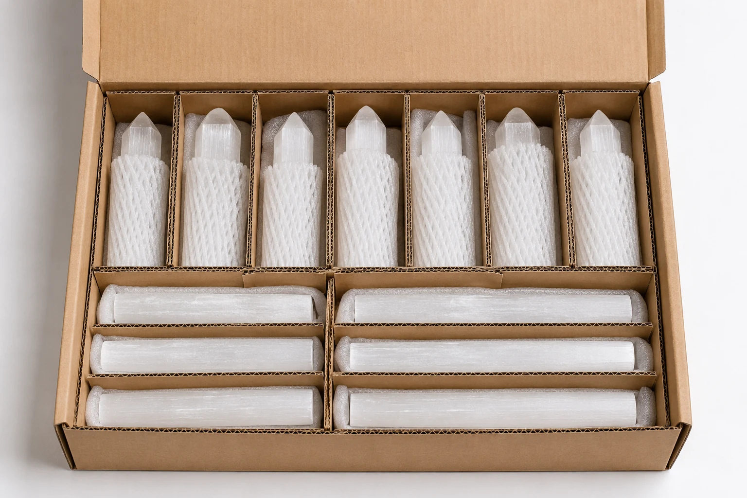 Protective Packaging for Fragile Selenite An example of proper selenite packaging, showing individually wrapped pieces in a snug inner box.