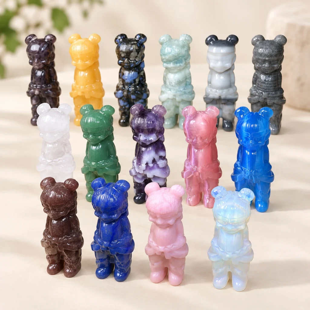 Assorted mixed material Chinese mythology warrior crystal carvings arranged on a light minimalist tabletop
