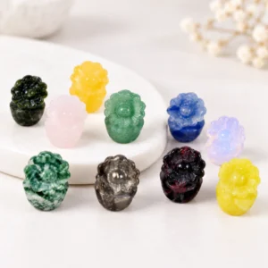 Assorted mixed material mini sunflower crystal carvings on a light minimalist tabletop