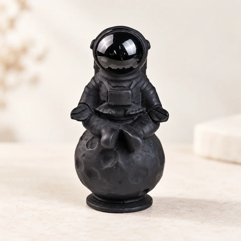 Obsidian Astronaut Crystal Carving