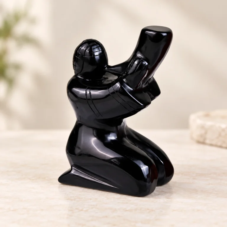 Obsidian Horn Player Crystal Carving