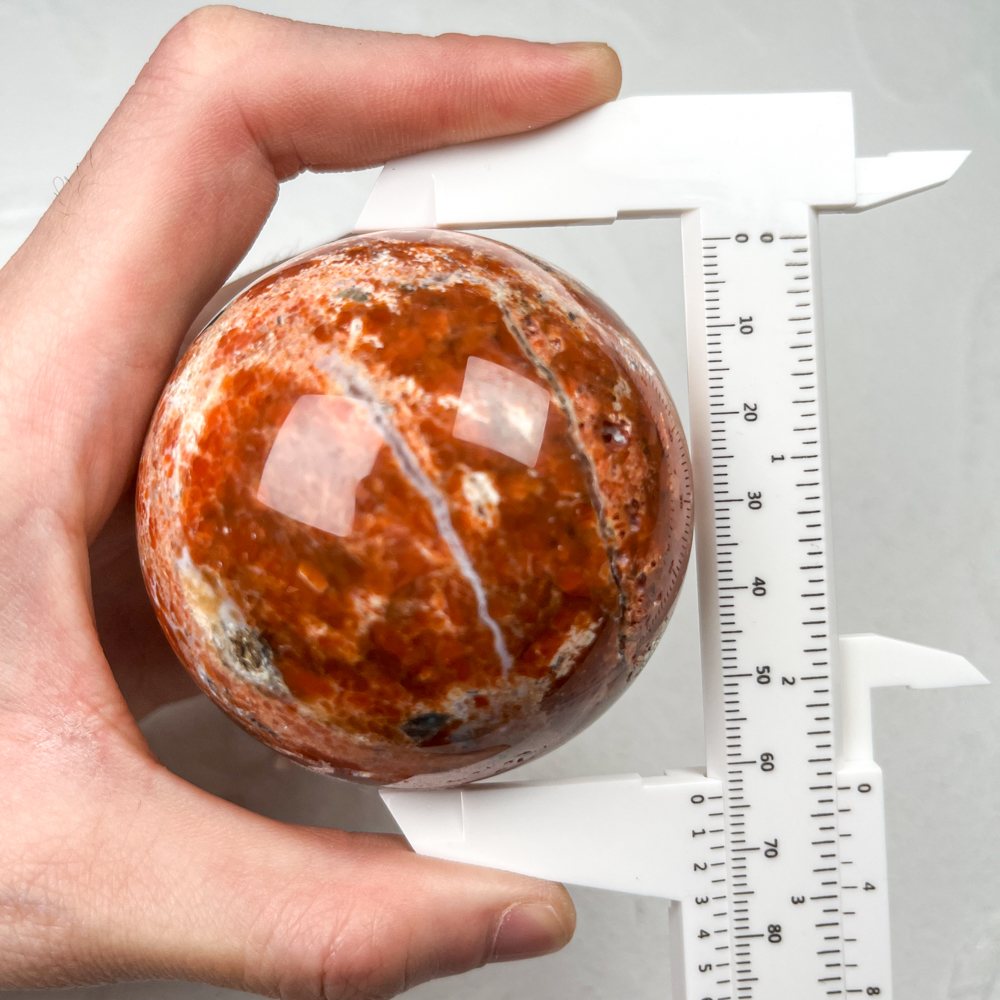 Sunstone With Blue Apatite Crystal Sphere wholesale polished crystal sphere product photo 2