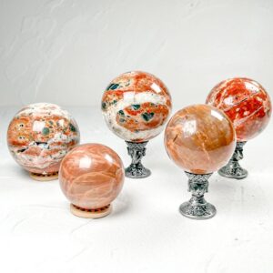 Sunstone With Blue Apatite Crystal Sphere wholesale polished crystal sphere product photo 3